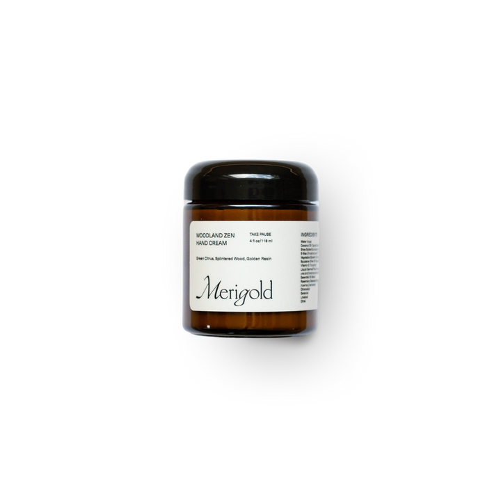 Merigold Woodland Zen Hand Cream in amber glass jar with black lid – grounding, plant-based moisturizer for dry hands with notes of cedarwood and earthy calm.