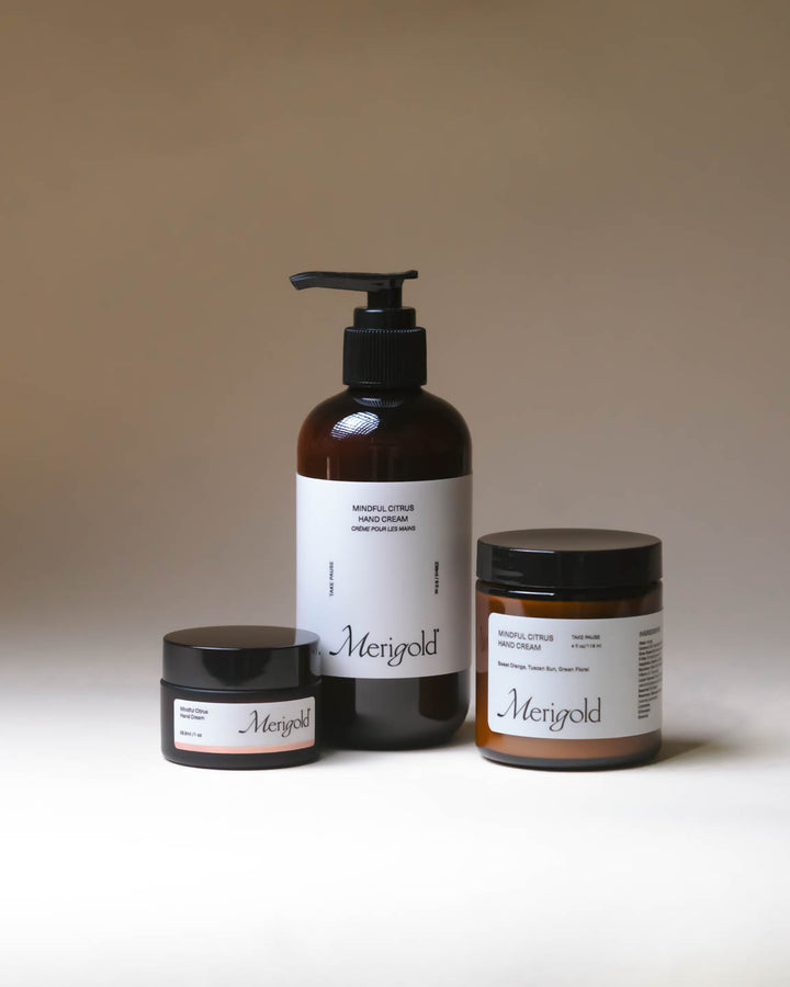 Merigold Mindful Citrus Hand Cream full size collection in amber packaging, bright citrus hydration.