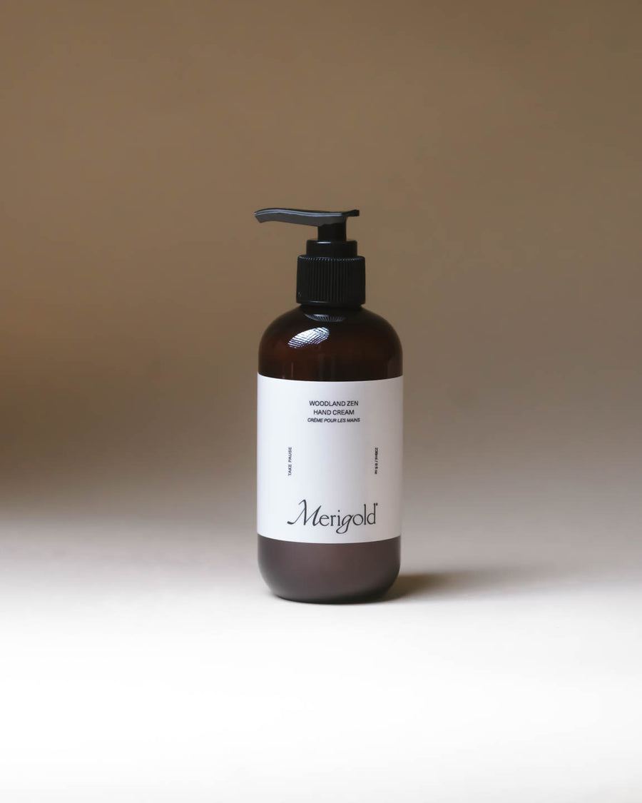  Merigold Woodland Zen Hand Cream in amber packaging on neutral background, grounding hydrating clean hand cream.