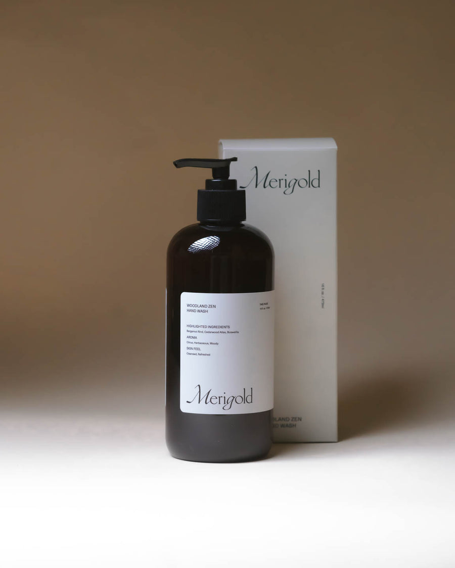 Merigold Woodland Zen Hand Soap with box packaging, 16 oz amber pump bottle and matching carton, grounding natural hand wash.